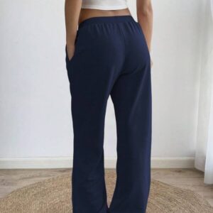 Retro 87 Loose Jogger – กางเกงวอร์มขากระบอกปักเลข 87 สไตล์เรโทร